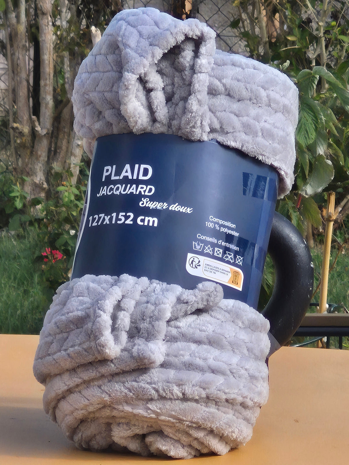 Étiquette et texture d’un plaid jacquard gris